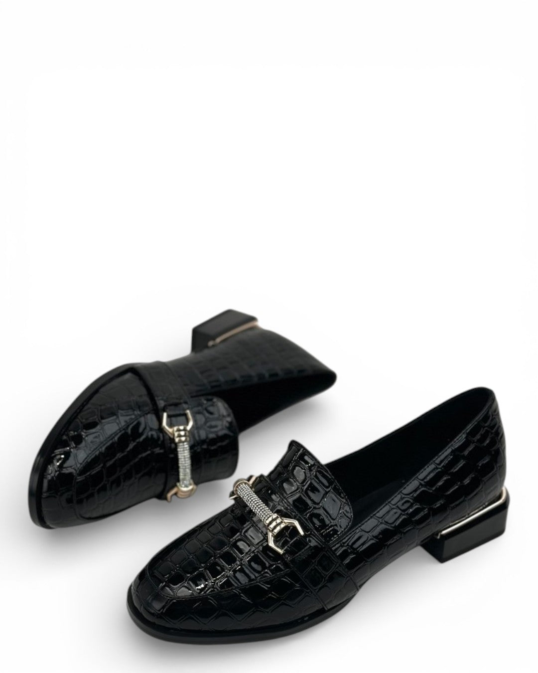 Orthopedic loafers with a crocodile pattern