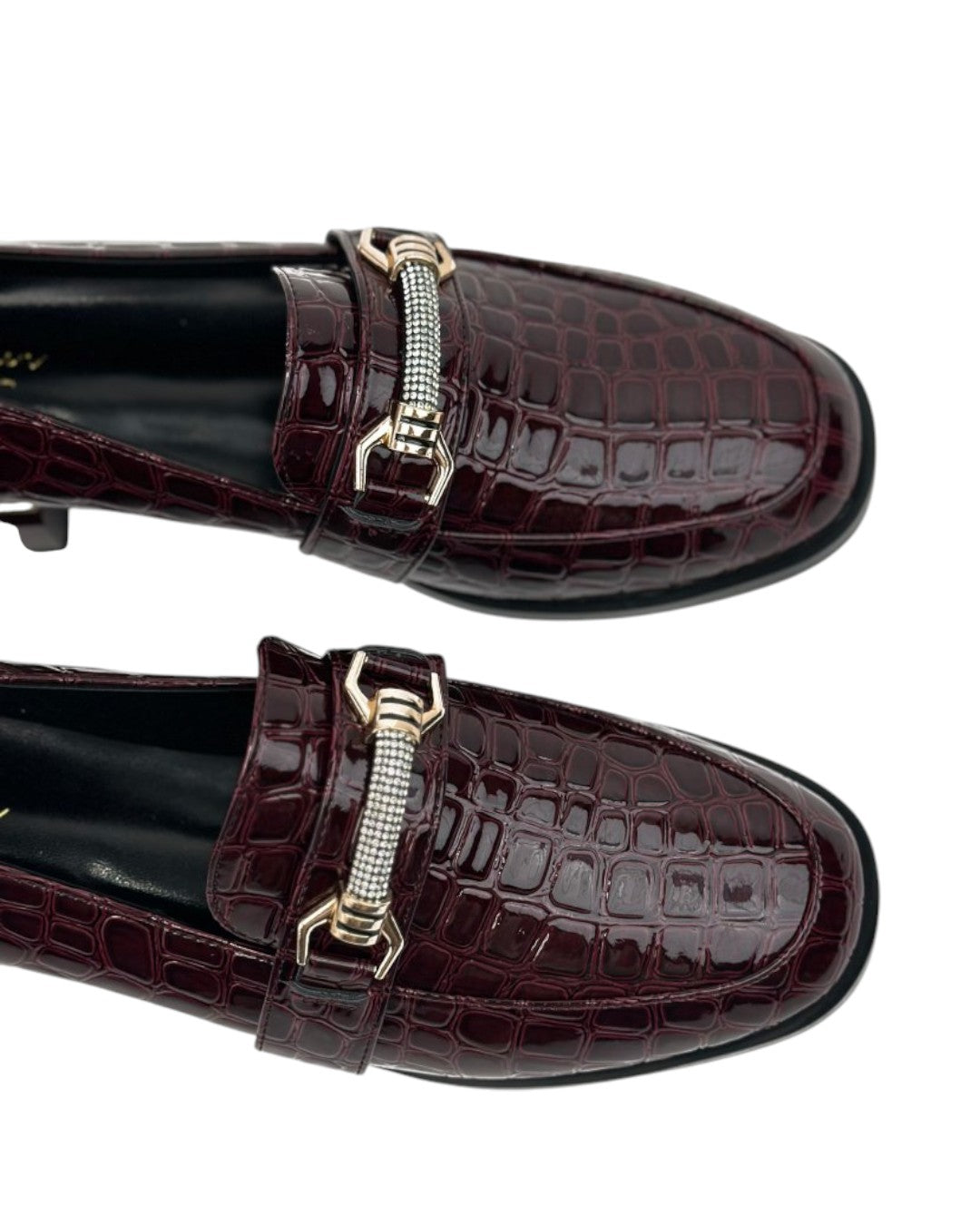 Orthopedic loafers with a crocodile pattern