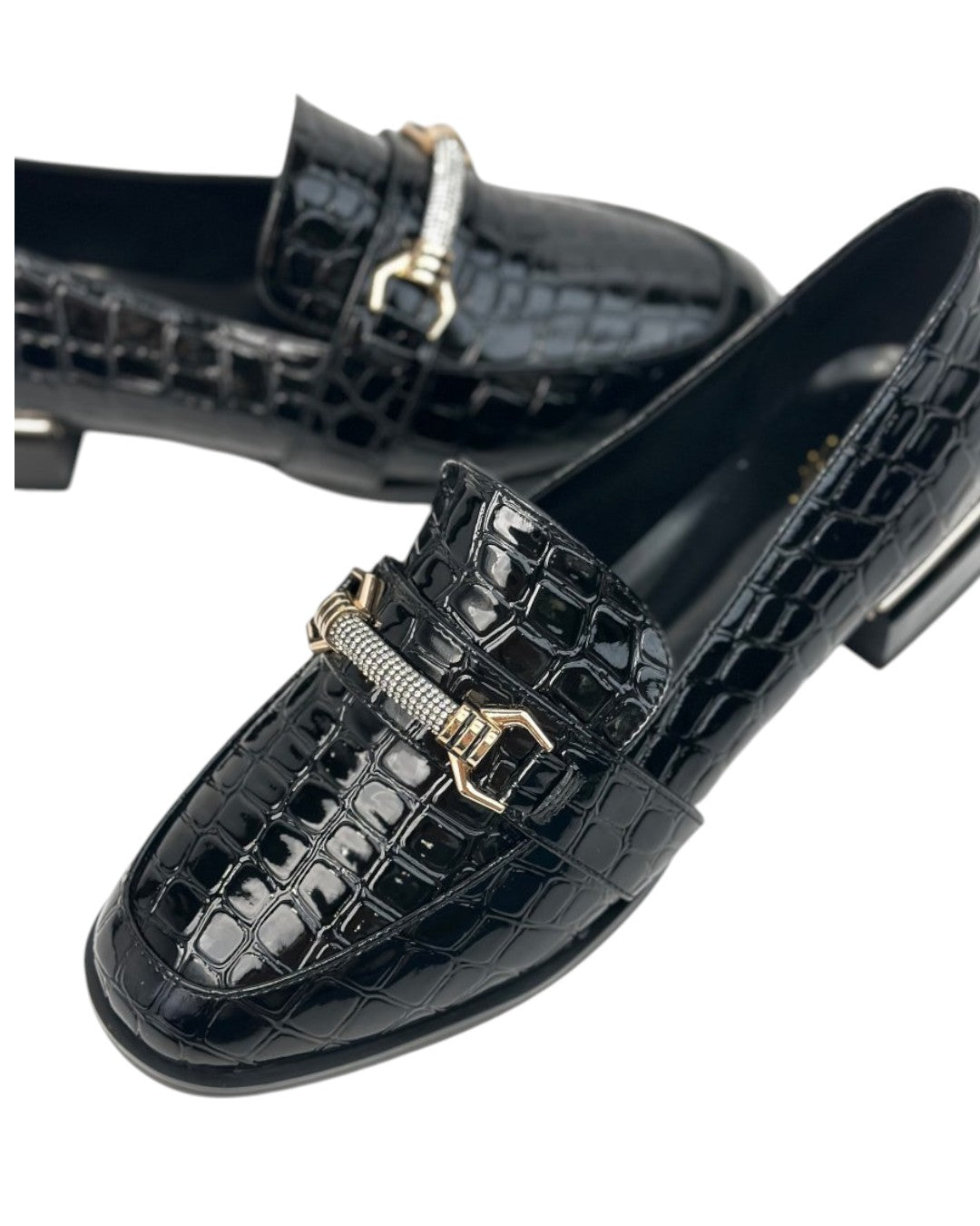 Orthopedic loafers with a crocodile pattern