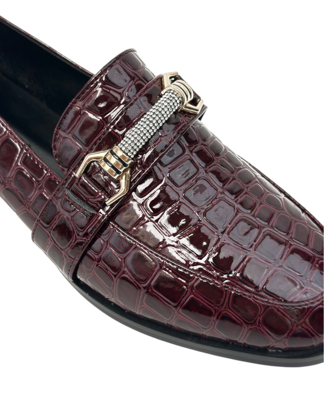 Orthopedic loafers with a crocodile pattern