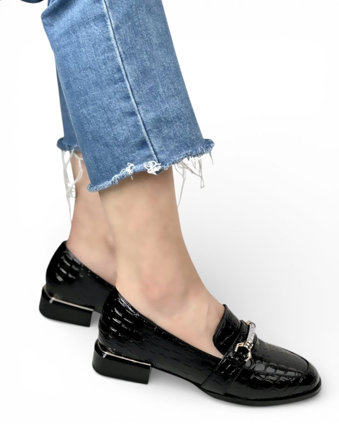 Orthopedic loafers with a crocodile pattern